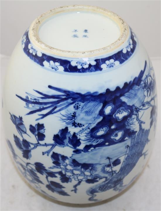 A Chinese blue and white ovoid jar, Kangxi mark, late 19th century, 32cm, wood stand